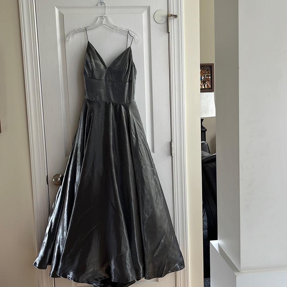Sherri Hill ball gown in shiny metallic gunmetal gray.